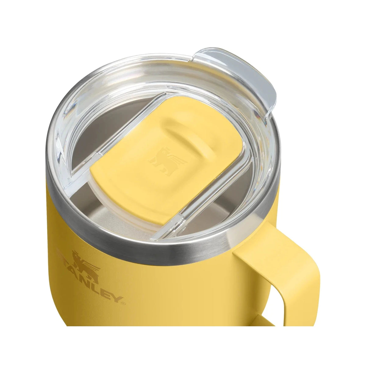Stanley Everyday camp mug in yellow with clear sliding lid, seen from above at an angle