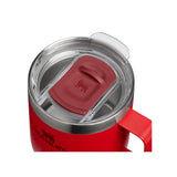 Stanley Everyday camp mug in red with a clear lid and red sliding cover, viewed from above and cropped at the edges