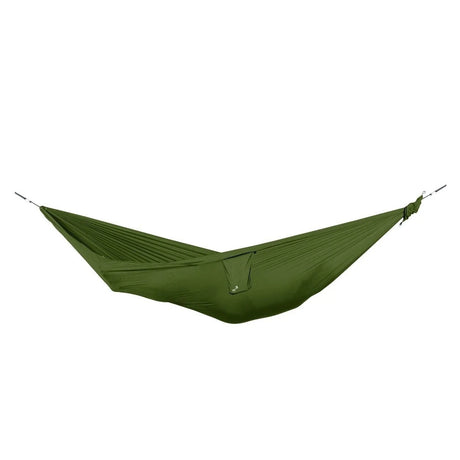 Ticket to the Moon Compact Hammock in Leaf Green, empty and suspended with gathered ends and cords