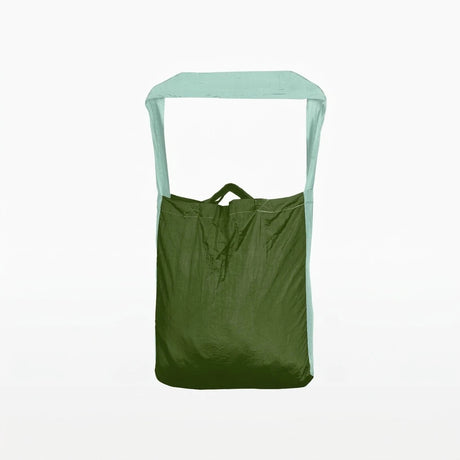 Ticket to the Moon Lightweight Foldable Eco Bag Medium in leaf green and mint, standing upright with pale green strap