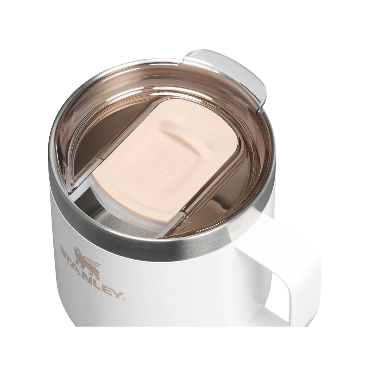 Stanley Everyday camp mug in white with a brown-tinted lid, viewed from above with its handle to the right