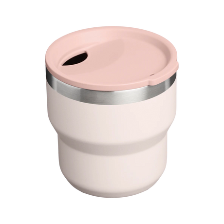 Stanley Stay Hot stacking camp cup in pale pink with lid on, seen from slightly above
